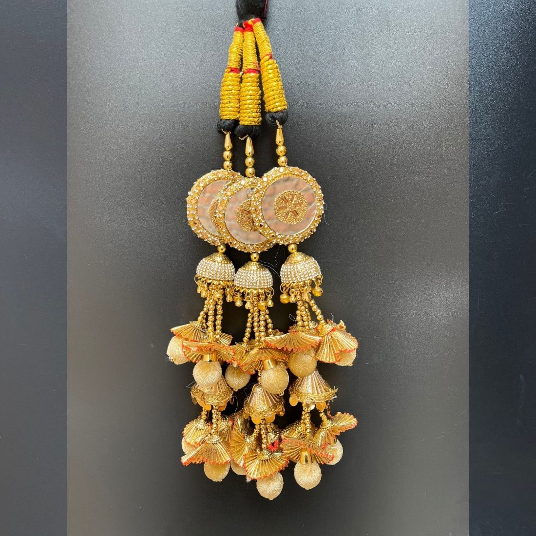 Golden Stone & Mirror Work Paranda with Heavy Jhumka Layers – Bridal Punjabi Hair Accessory